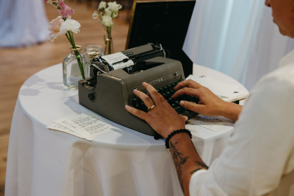 Wedding Photography 
Poet typing on type writer 
poems for guests as party favors 
