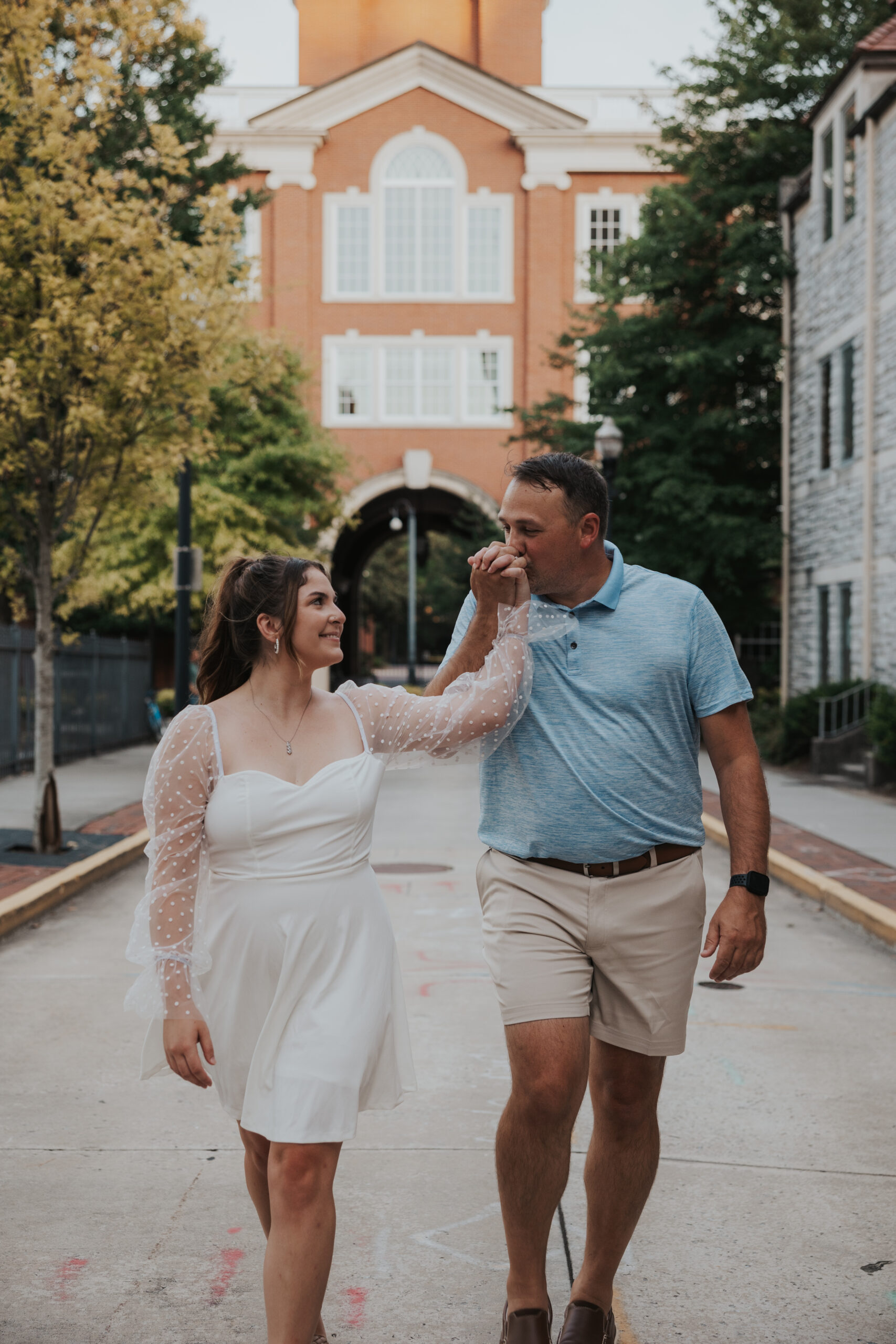 Couple choosing downtown Knoxville for their engagement photo location