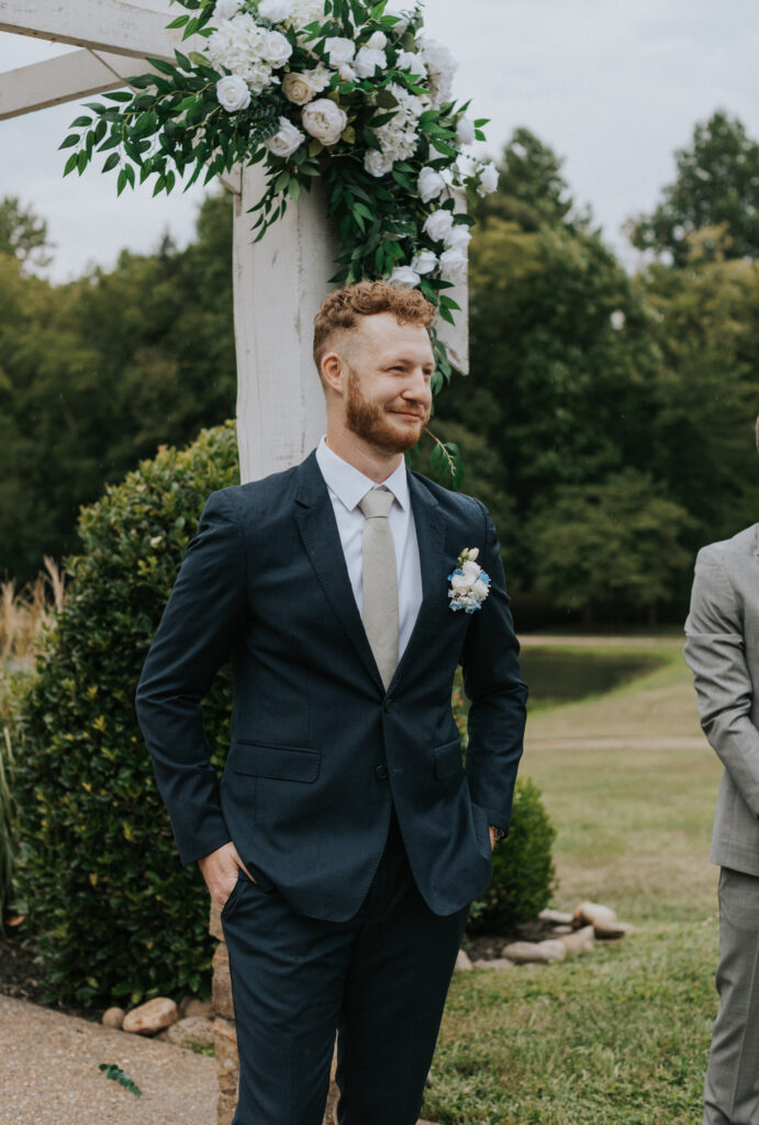 Groom waiting for his bride to walk down the aisle 