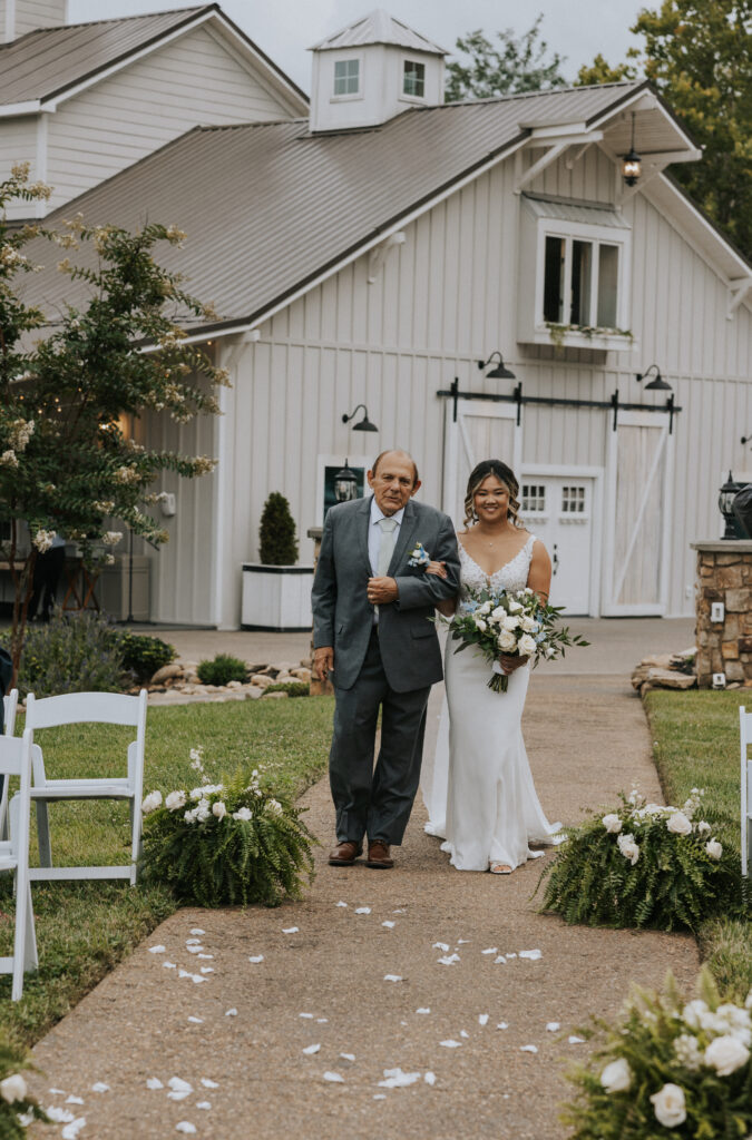 Wedding Photography Bride and her father walking down the aisle 