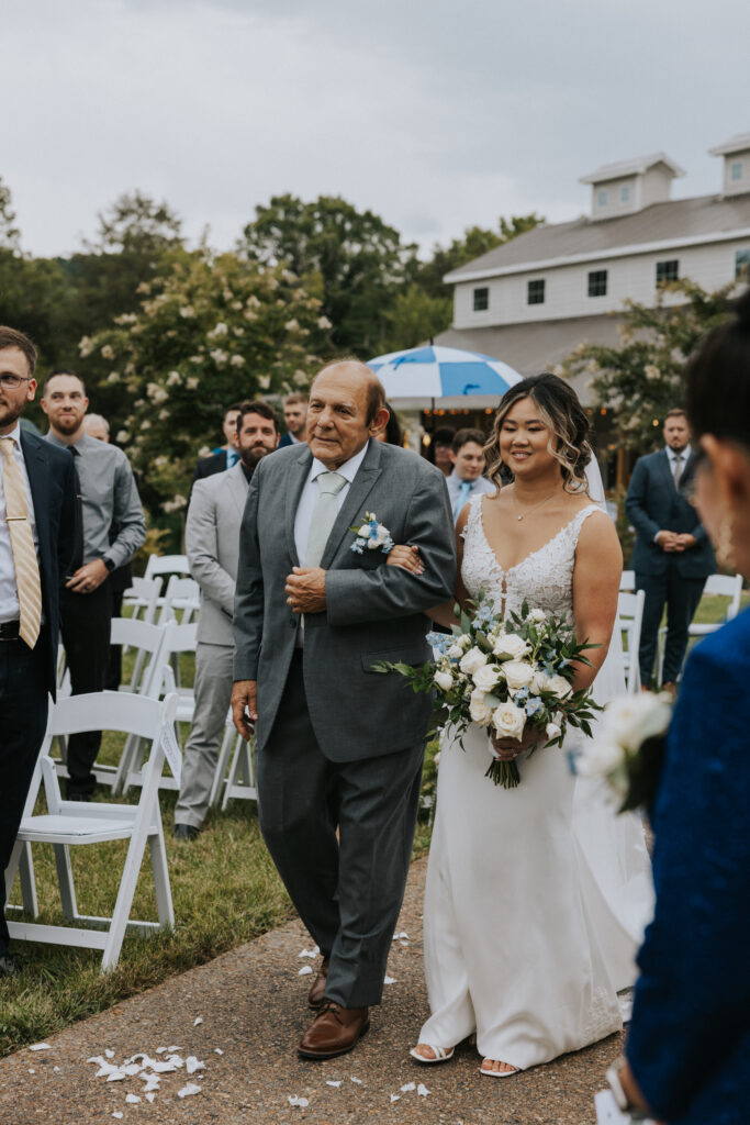 Bride and her father walking down the aisle