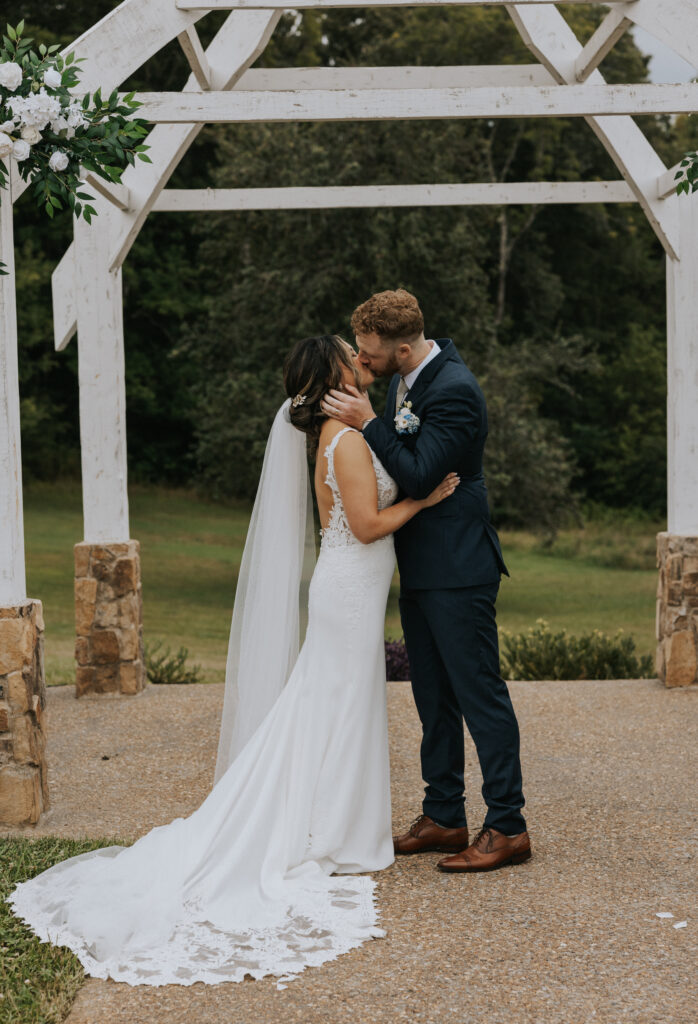 Wedding Photography Bride and Groo first kiss