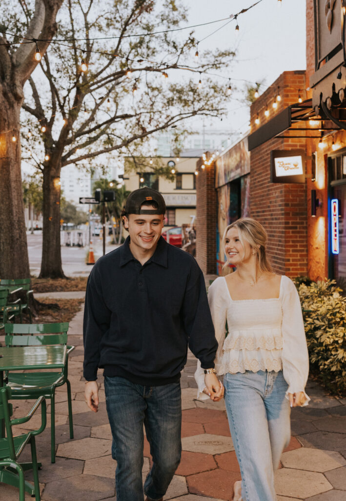 couple walking through downtown St. Pete