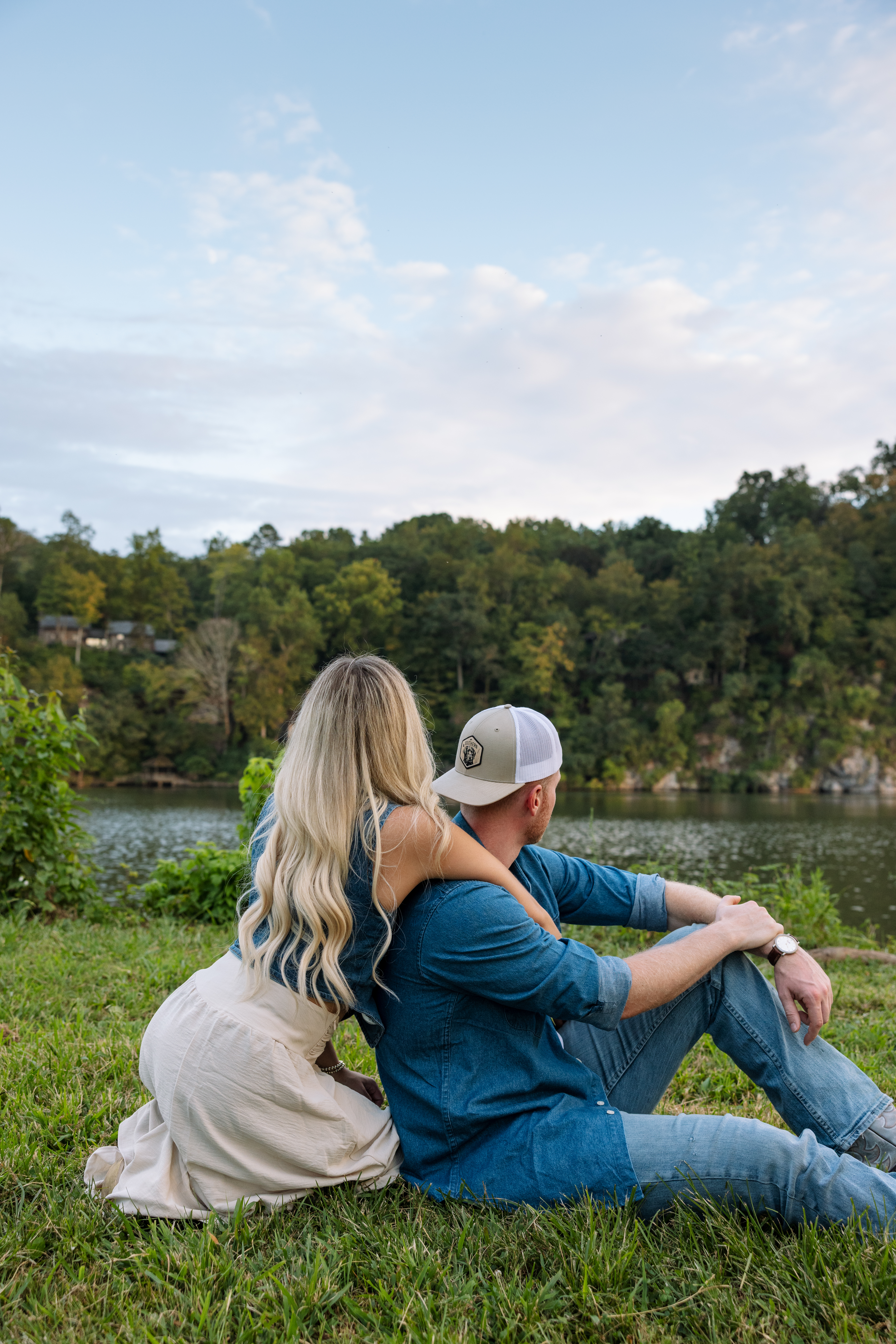 Close-up of an engaged couple embracing in overcast light, modern Western engagement photography in Knoxville