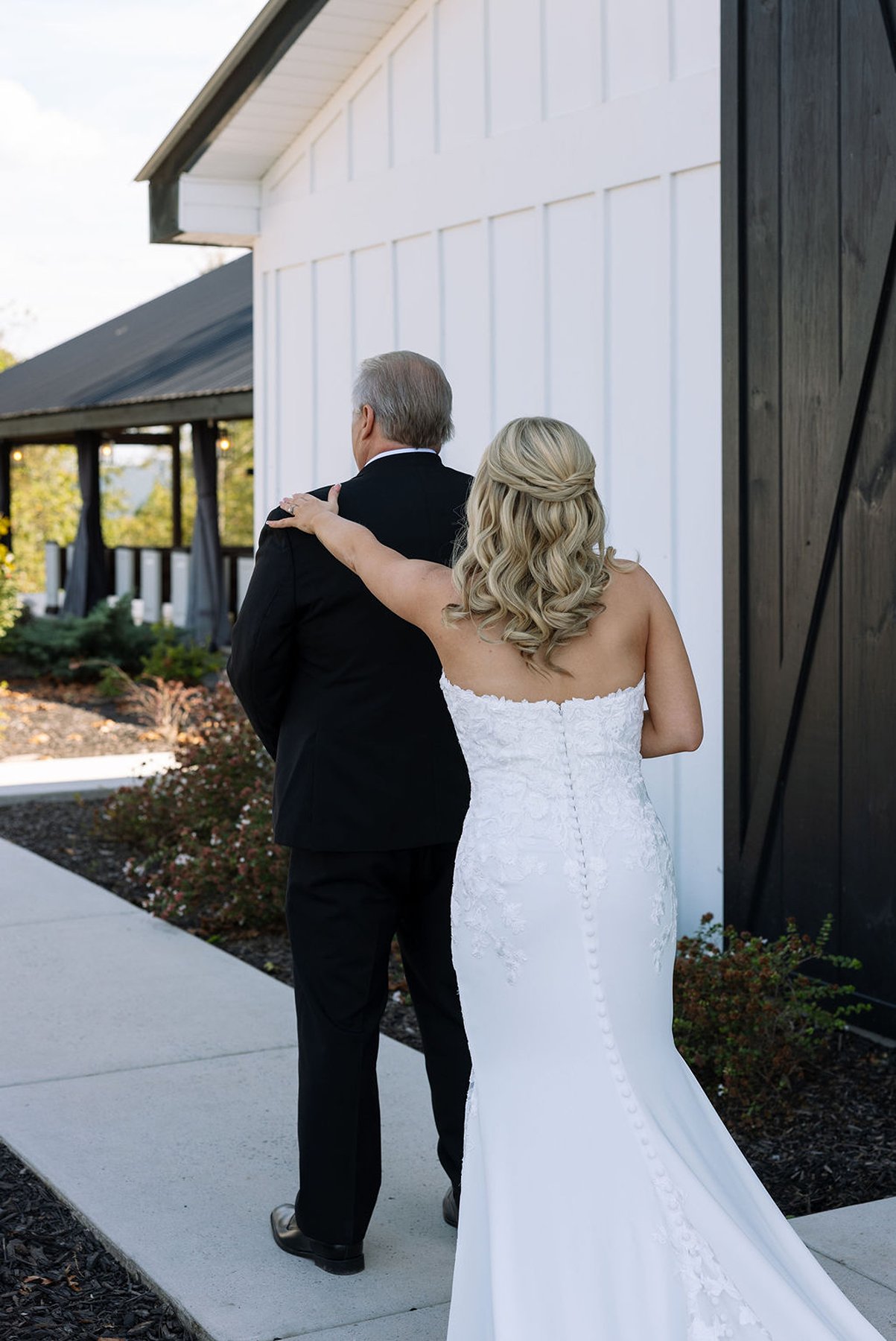 Bride and father walking together before ceremony at Tennessee wedding venue