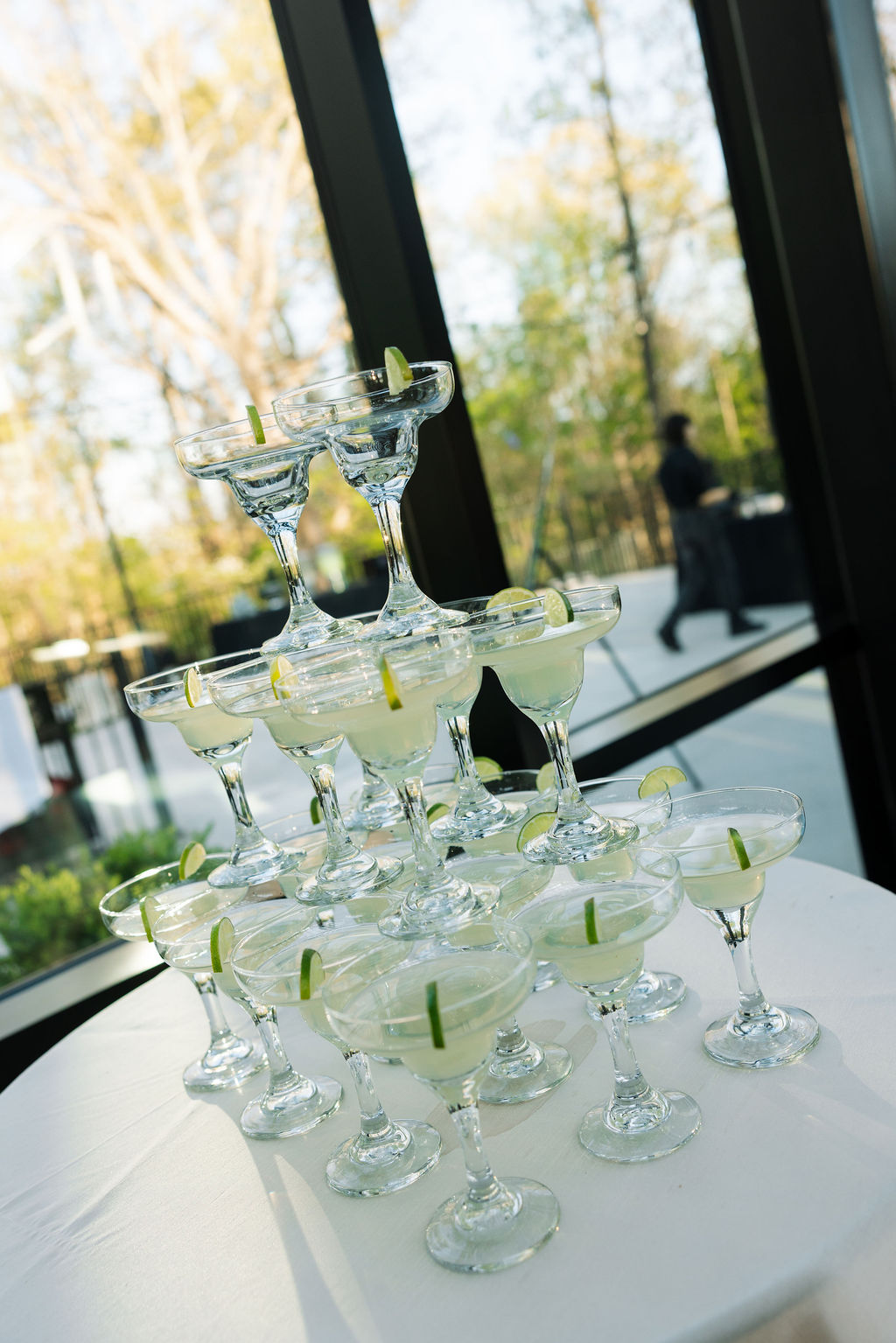 Margarita tower display near window during cocktail hour, fun reception detail at a nichols heir wedding