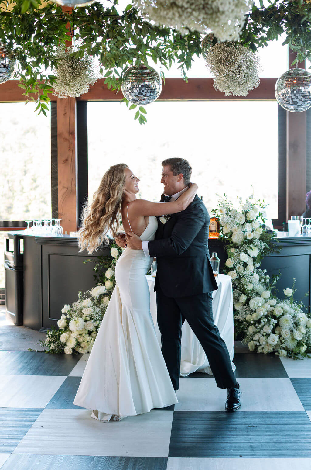 Bride and groom sharing their first dance indoors at a Knoxville wedding venue