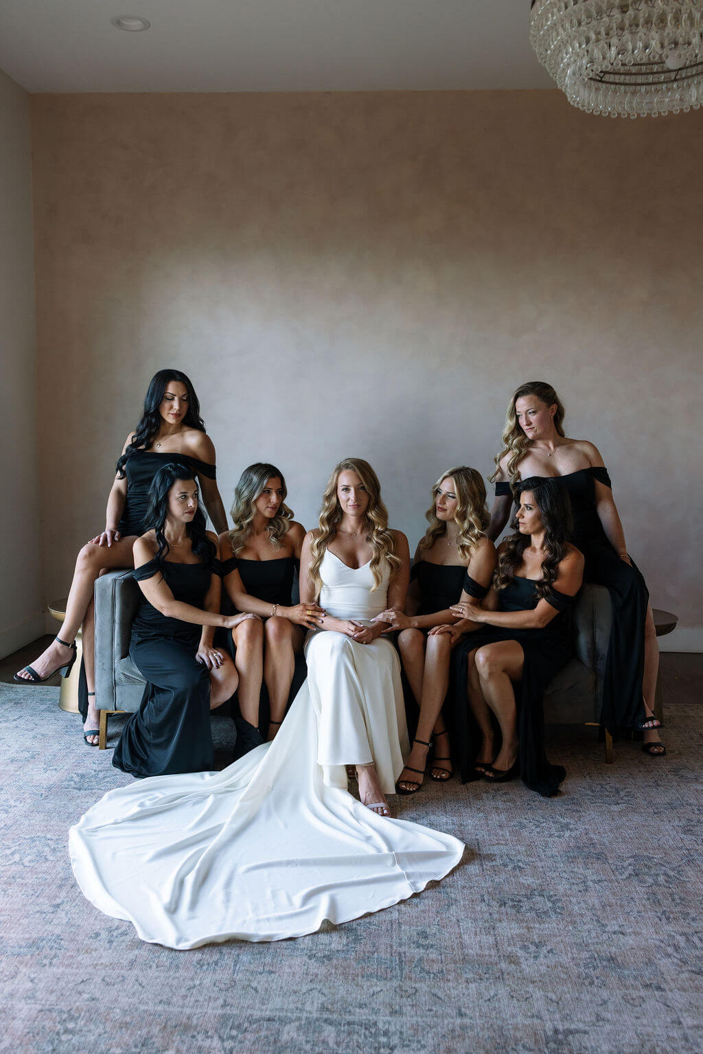 Bride with bridesmaids in black dresses during wedding morning at a Knoxville wedding venue