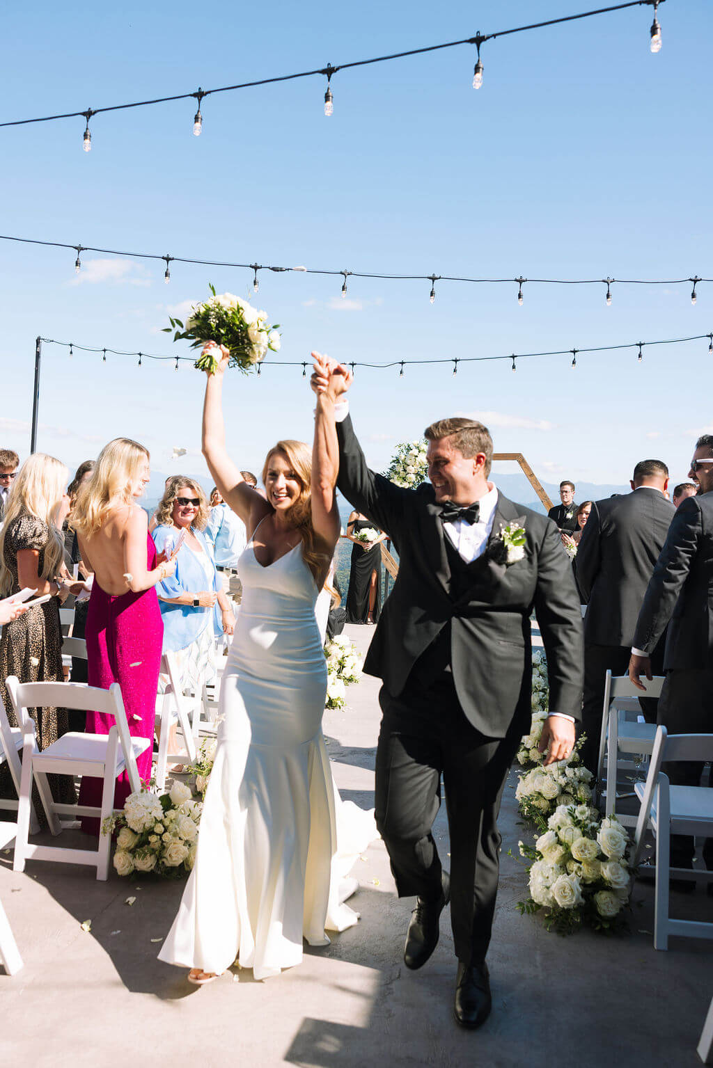 Newlyweds celebrating after ceremony at a Knoxville wedding venue