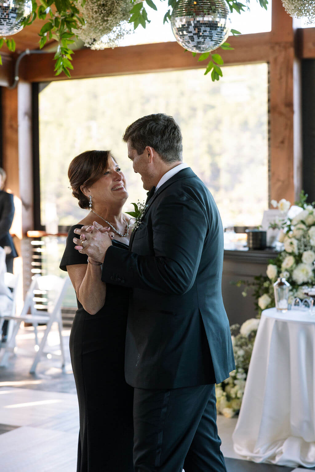 Groom dancing with his mother during wedding reception at a Knoxville wedding venue