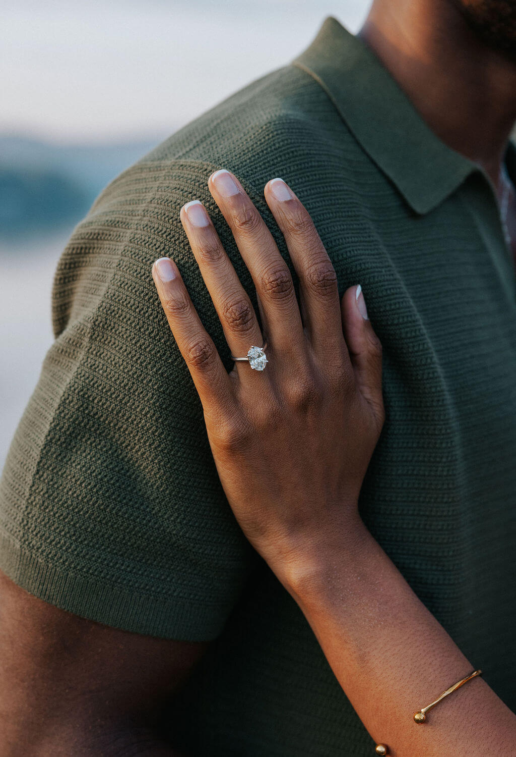 Close-up engagement ring photo during a Knoxville, Tennessee proposal session by the lake.