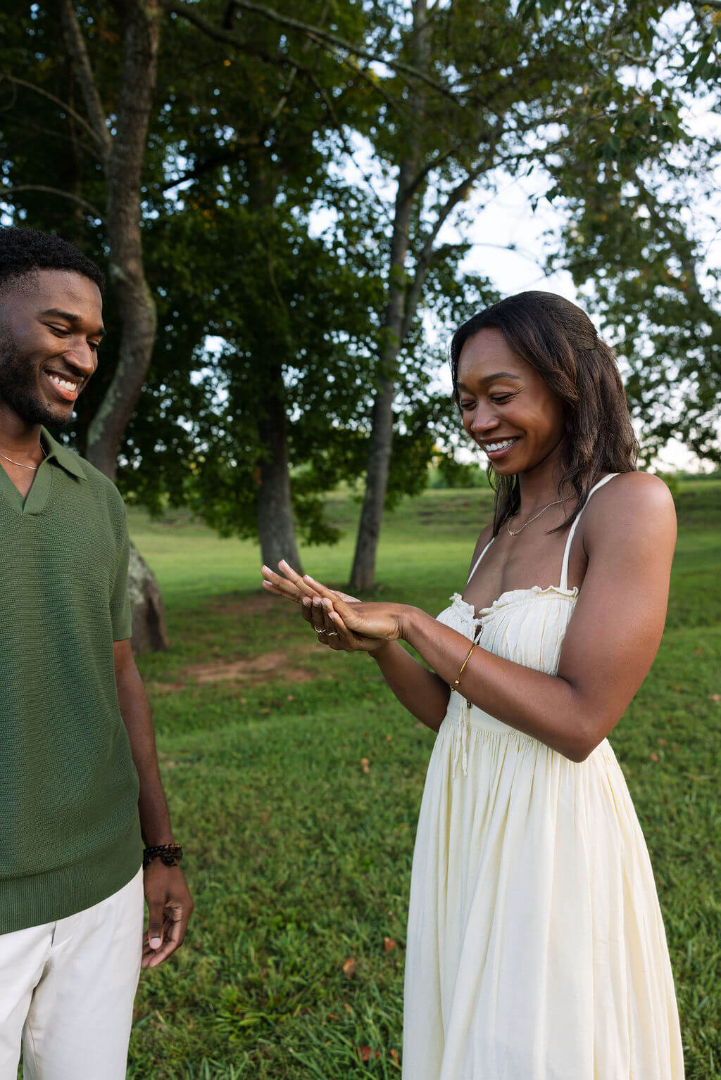 Bride-to-be reacting after a proposal during a Knoxville, Tennessee engagement session in the park.