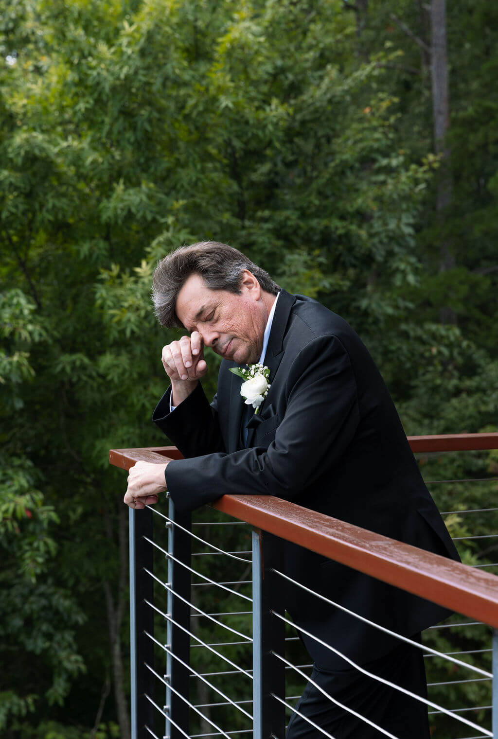 Emotional father of the bride portrait before wedding ceremony