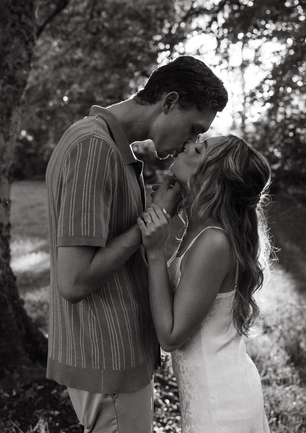 Black and white close up engagement portraits at Maple Grove Estate with dramatic lighting