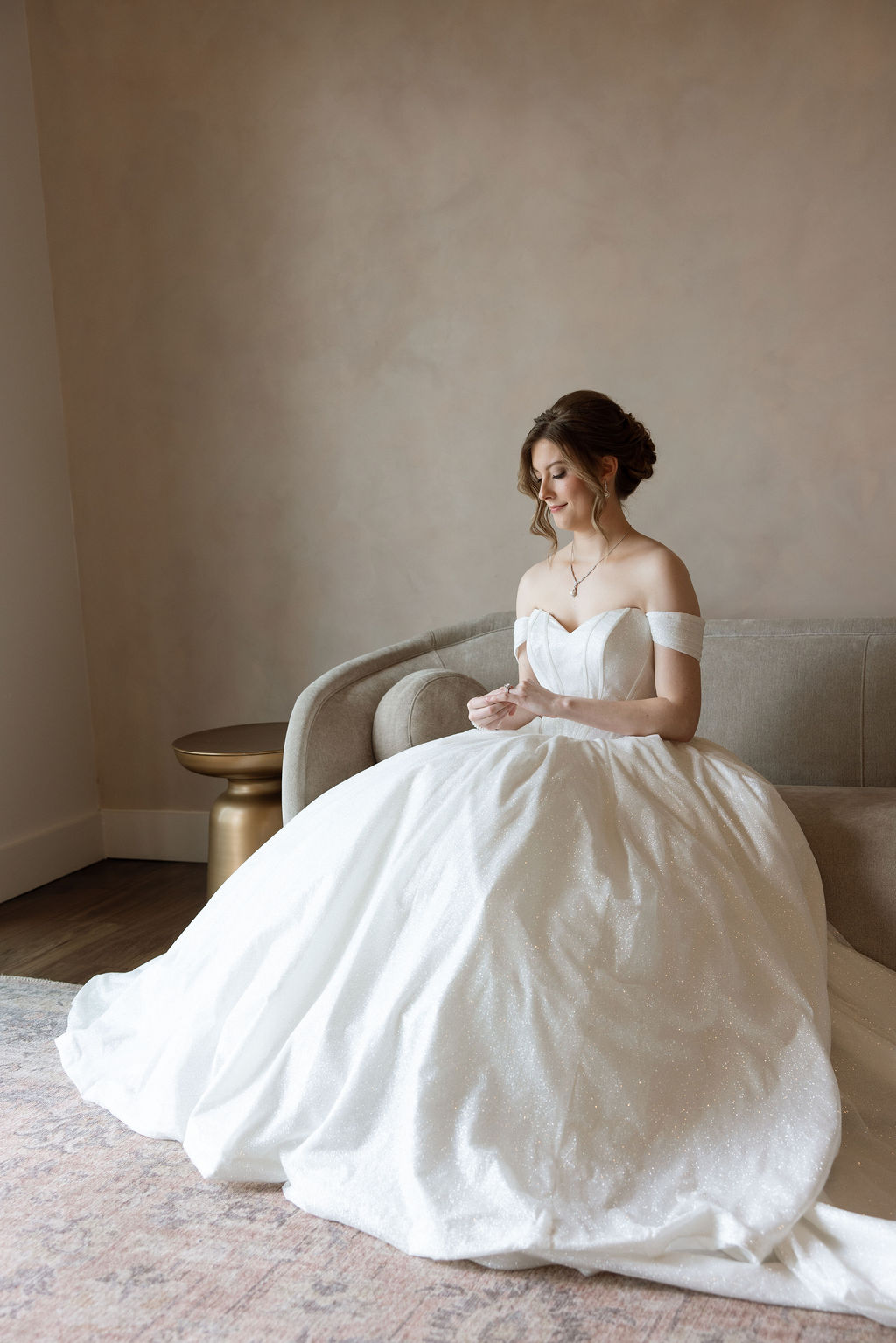 Bridal portrait inside a softly lit getting ready suite before the wedding ceremony