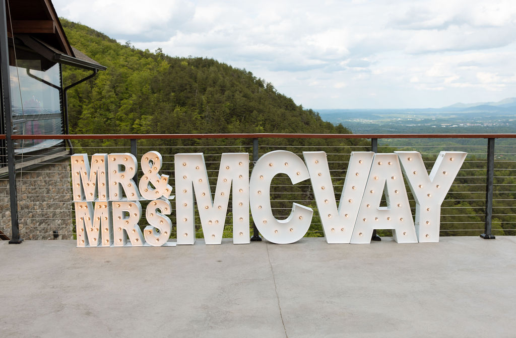 Marquee MR and MRS letters overlooking the Smoky Mountains at a Sevierville wedding venue
