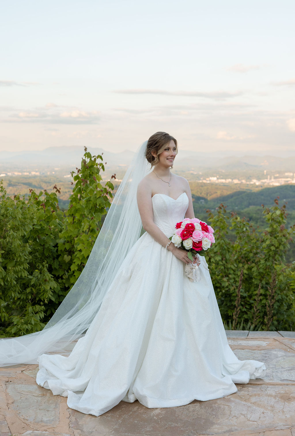 Bridal portrait overlooking the Smoky Mountains during sunset at a Sevierville wedding venue